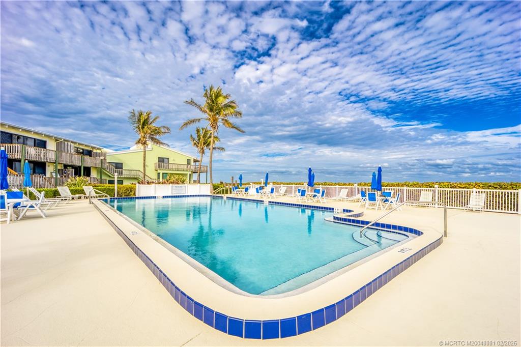 2355 Northeast Ocean Boulevard, Unit 19B Stuart, FL 34996 - Photo 18 of 20 a view of swimming pool with seating space