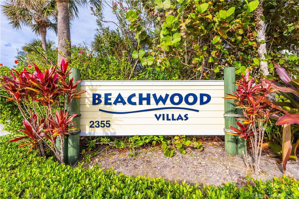 2355 Northeast Ocean Boulevard, Unit 19B Stuart, FL 34996 - Photo 20 of 20 a sign on the side of a building