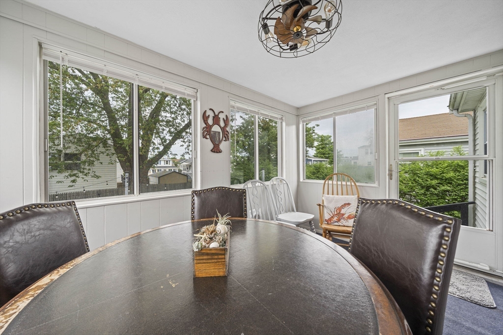 15 D Street Hull, MA 02045 - Photo 13 of 42 a living room with furniture and a large window