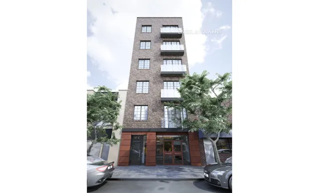 a bathroom with a shower and a mirror