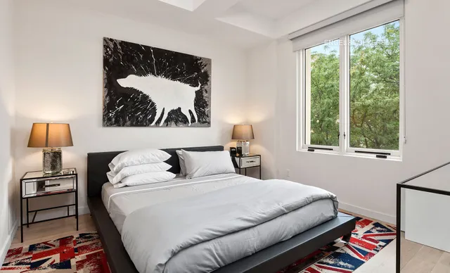 a kitchen with a table chairs refrigerator and a counter top space