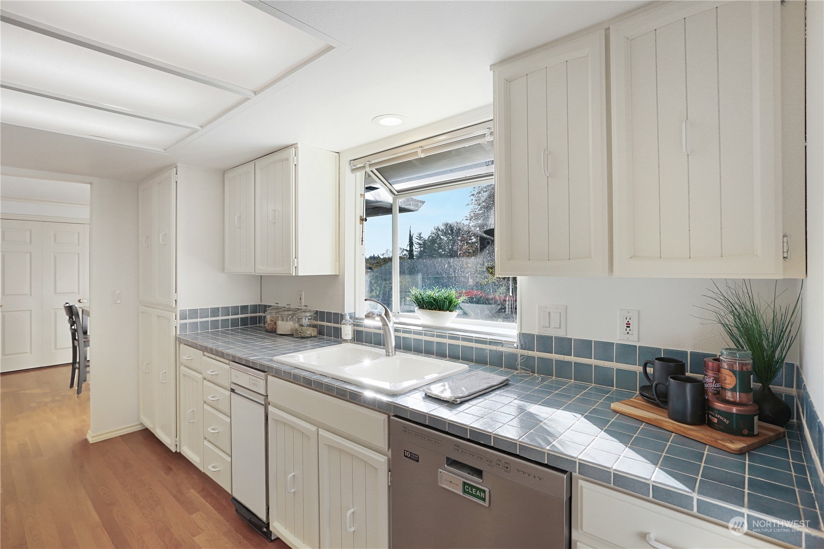15203 Southeast 132nd Street Renton, WA 98059 - Photo 12 of 35 a kitchen with sink and window