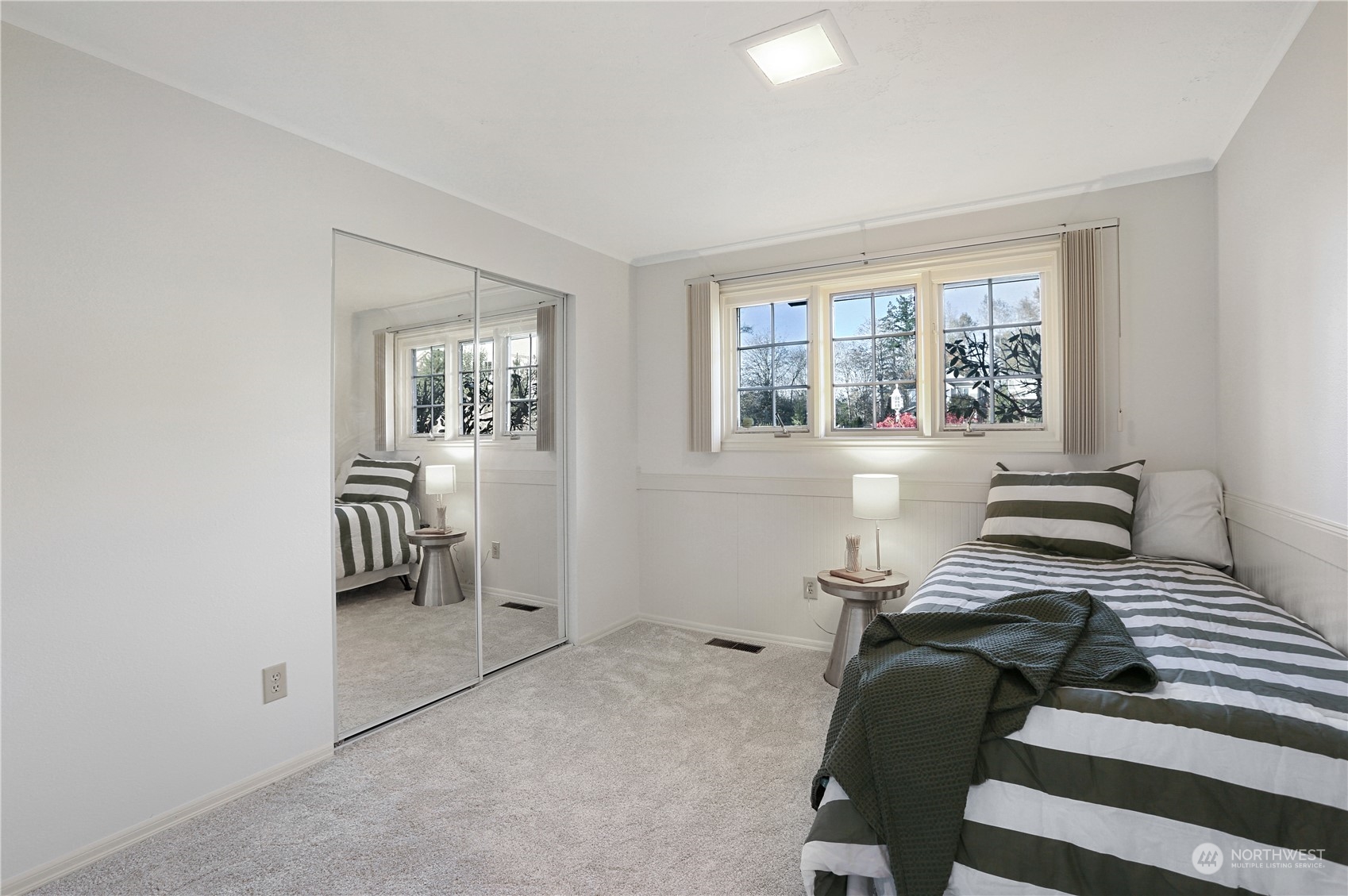 15203 Southeast 132nd Street Renton, WA 98059 - Photo 21 of 35 a view of a livingroom with furniture and windows