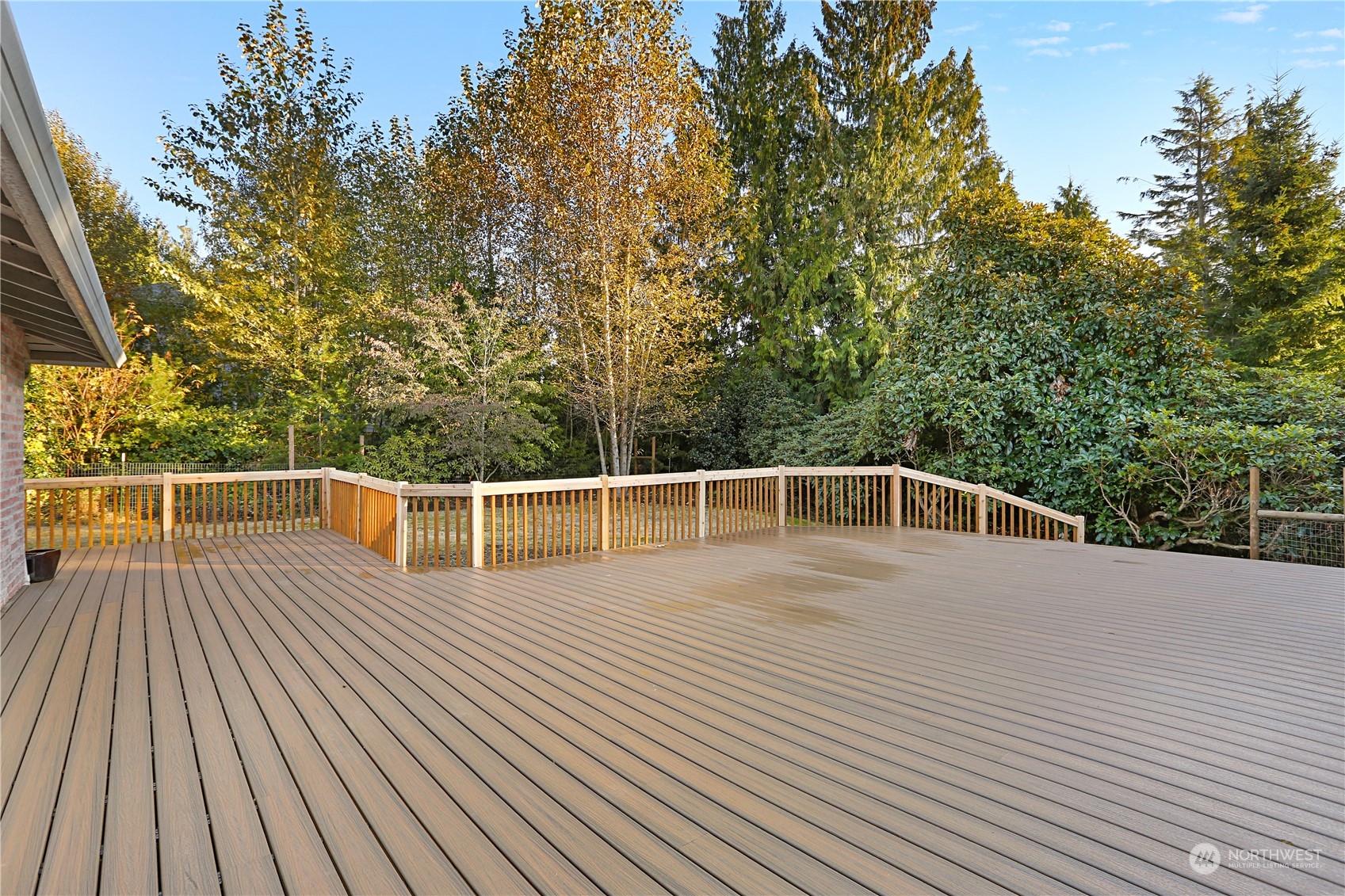 15203 Southeast 132nd Street Renton, WA 98059 - Photo 27 of 35 a view of a balcony with wooden floor and outdoor space