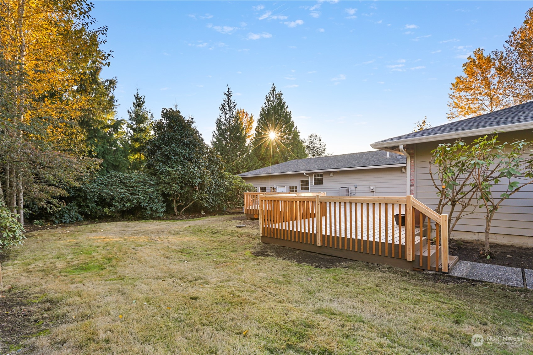 15203 Southeast 132nd Street Renton, WA 98059 - Photo 29 of 35 a view of a backyard with a tree