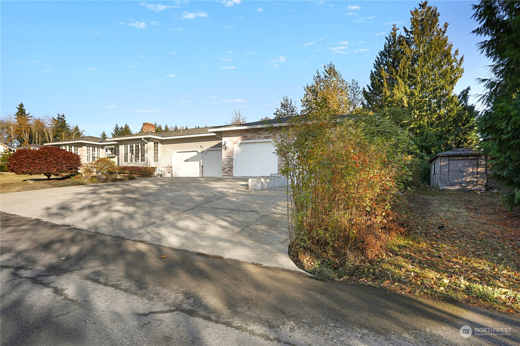 15203 Southeast 132nd Street Renton, WA 98059 - Photo 31 of 35 a view of a house with a yard