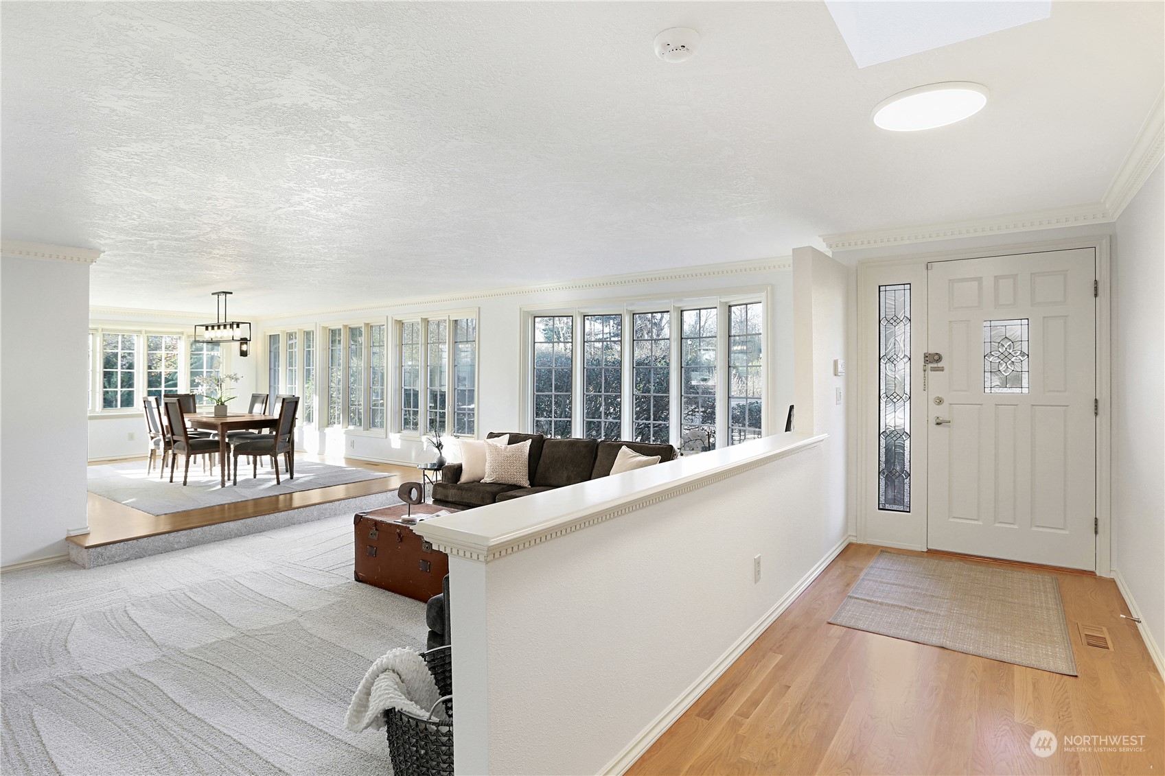 15203 Southeast 132nd Street Renton, WA 98059 - Photo 5 of 35 a large living room with a large window
