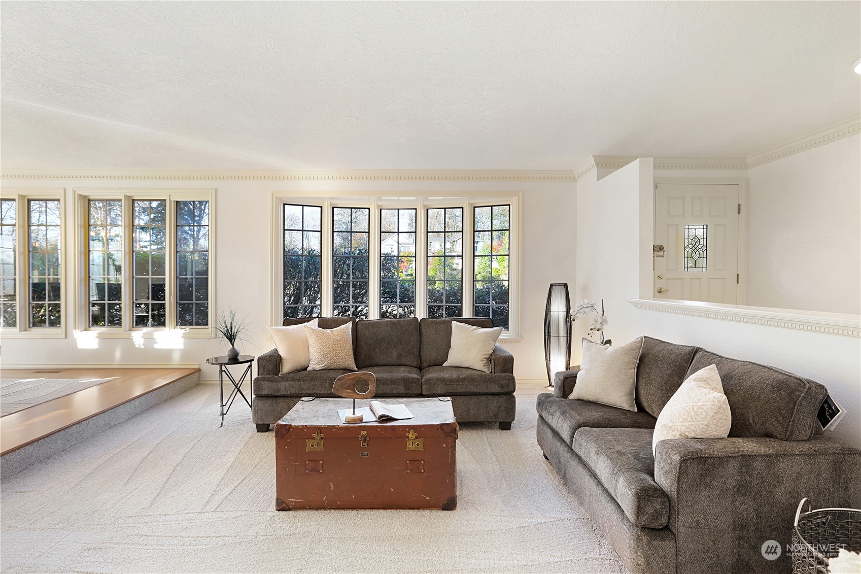 15203 Southeast 132nd Street Renton, WA 98059 - Photo 6 of 35 a living room with furniture and a large window