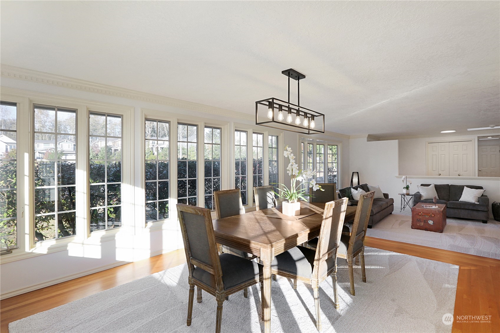 15203 Southeast 132nd Street Renton, WA 98059 - Photo 9 of 35 a view of a dining room with furniture window and outside view