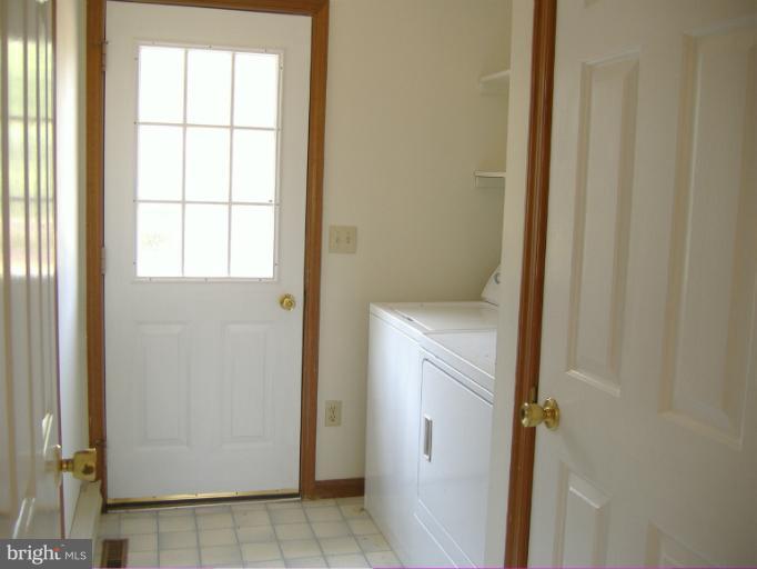 22611 Indian Point Road Bozman, MD 21612 - Photo 12 of 29 laundry room with full bath