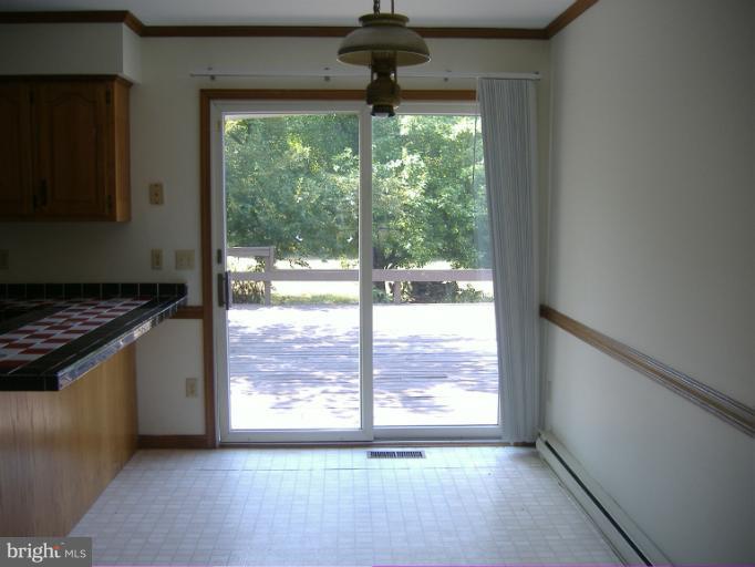 22611 Indian Point Road Bozman, MD 21612 - Photo 27 of 29 breakfast room with slider to deck