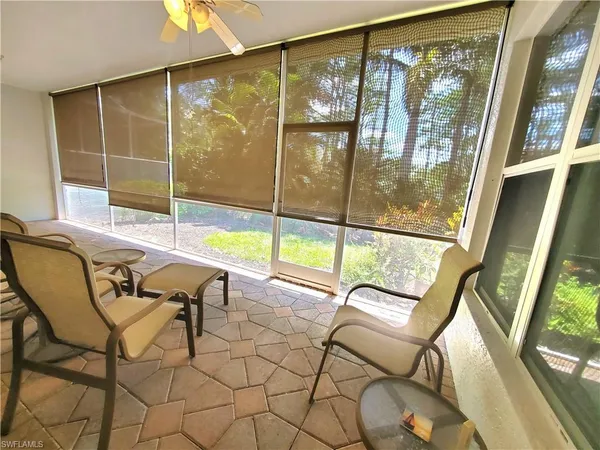 a view of house with yard and green space