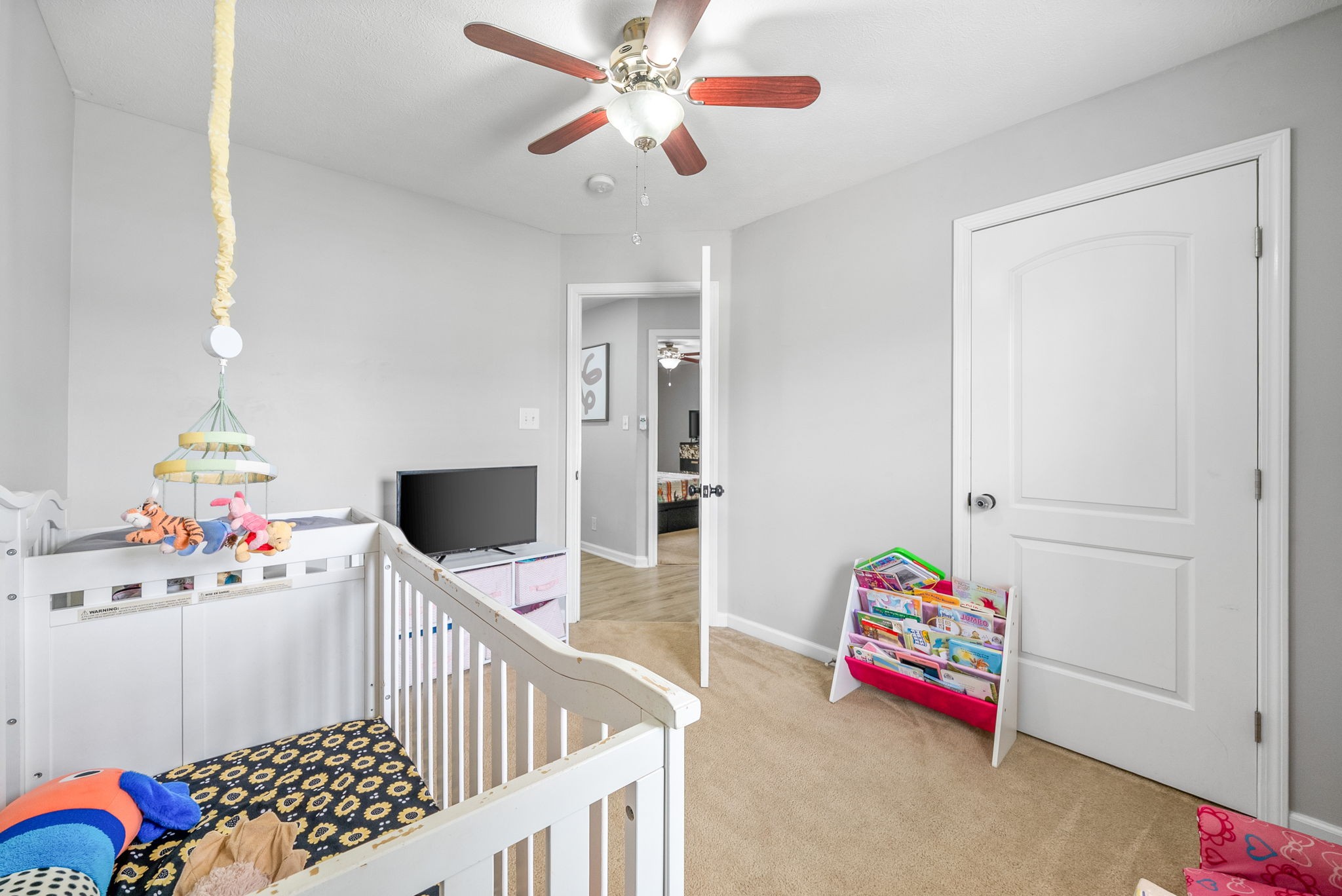 1556 Apache Way Clarksville, TN 37042 - Photo 16 of 24 a bedroom with furniture and wooden floor