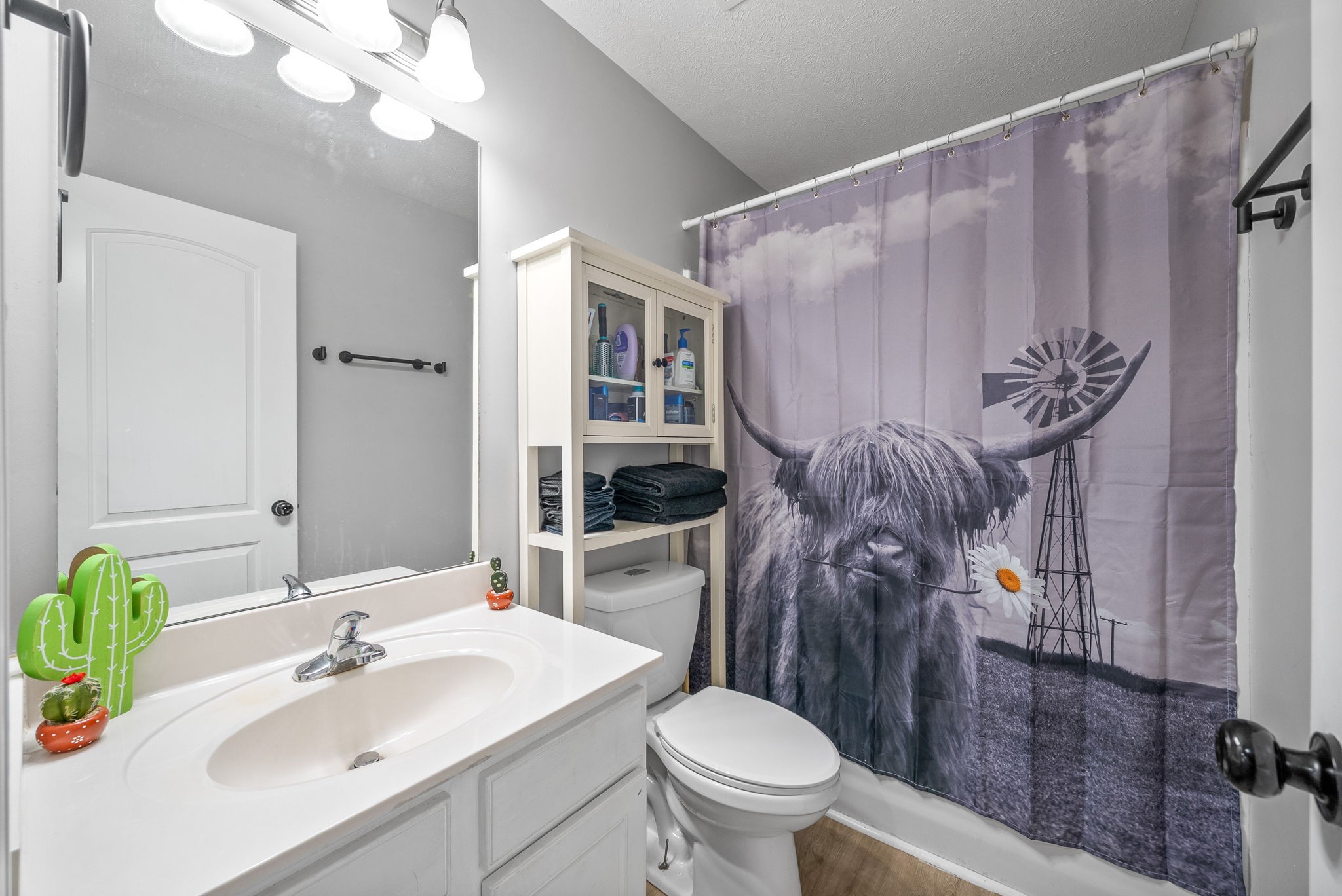 1556 Apache Way Clarksville, TN 37042 - Photo 17 of 24 a bathroom with a sink toilet and shower
