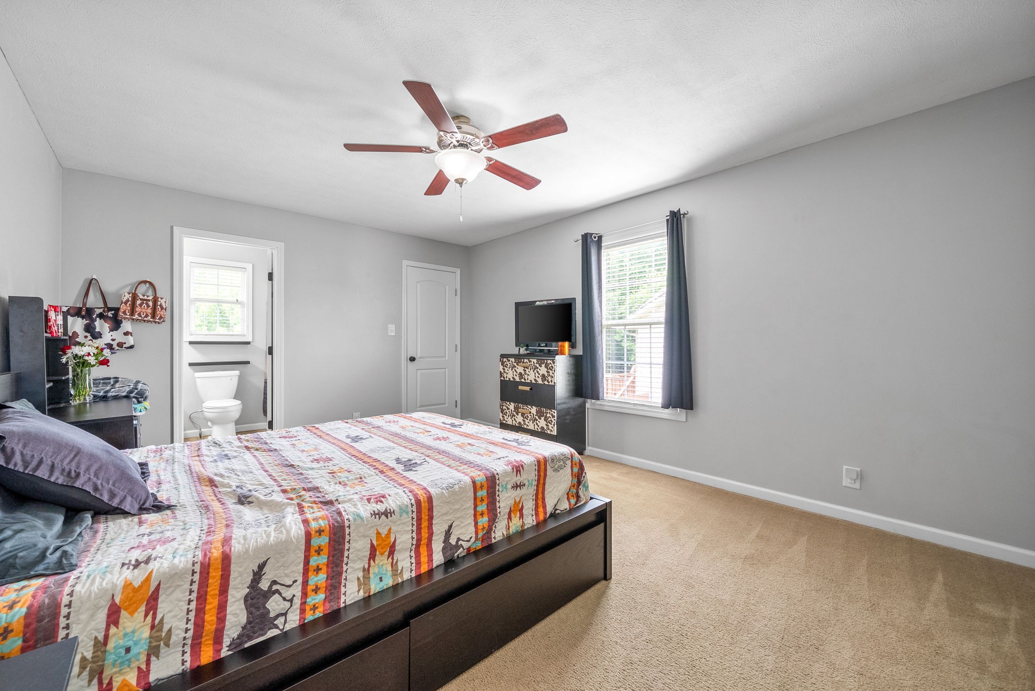 1556 Apache Way Clarksville, TN 37042 - Photo 18 of 24 a bedroom with a bed next to a window