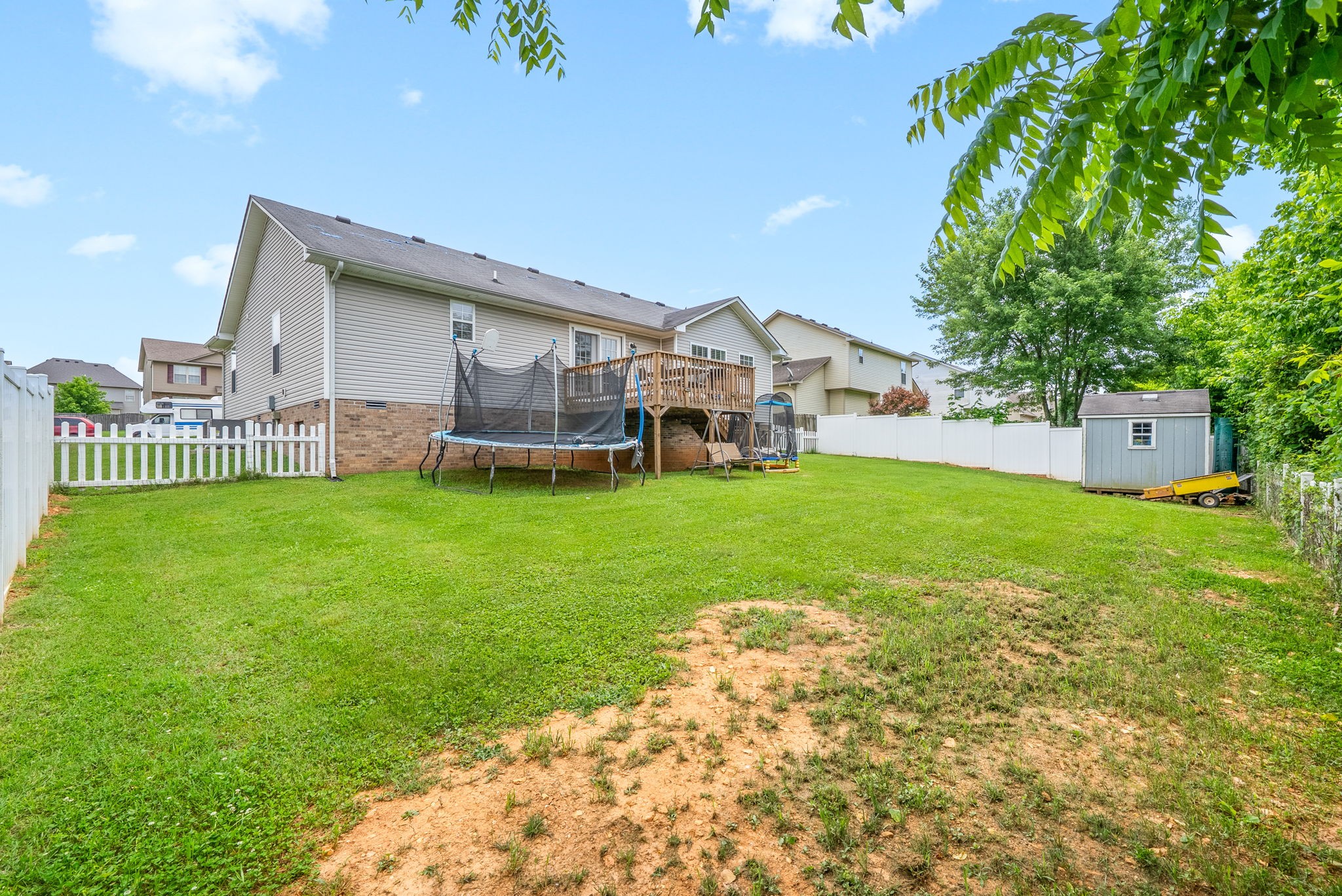 1556 Apache Way Clarksville, TN 37042 - Photo 24 of 24 a view of a house with a yard and sitting area