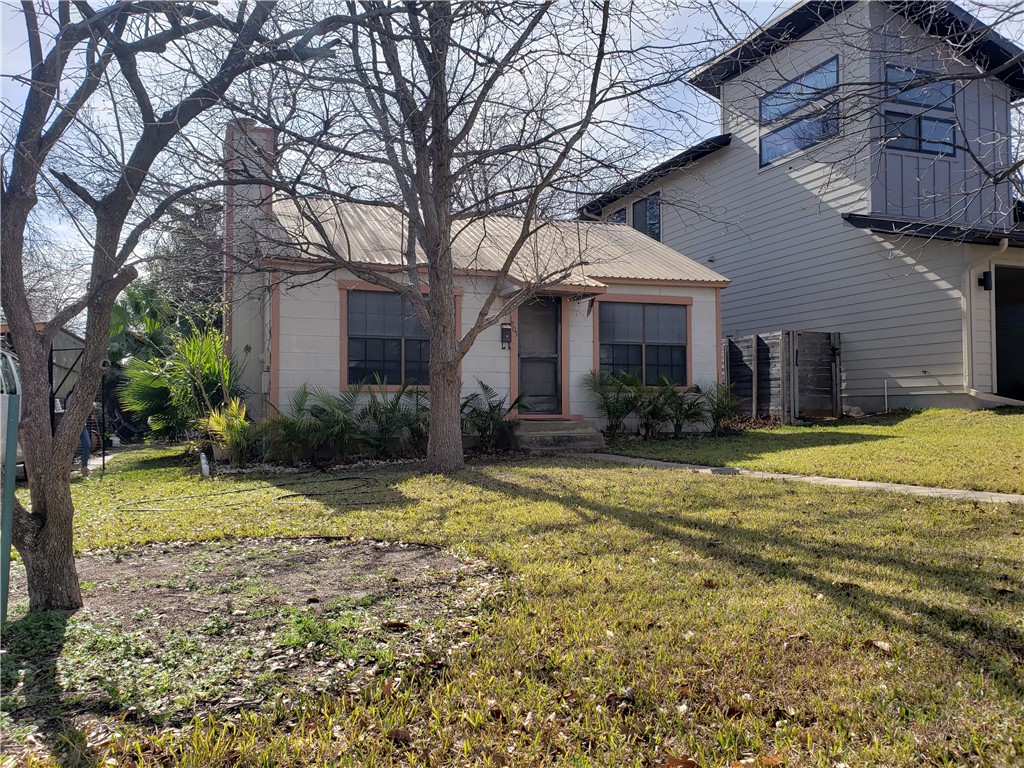 a view of a house with swimming pool