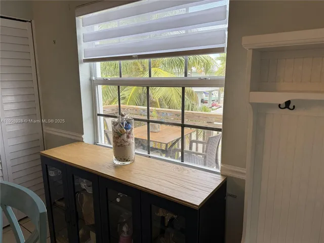 a dining room with a window