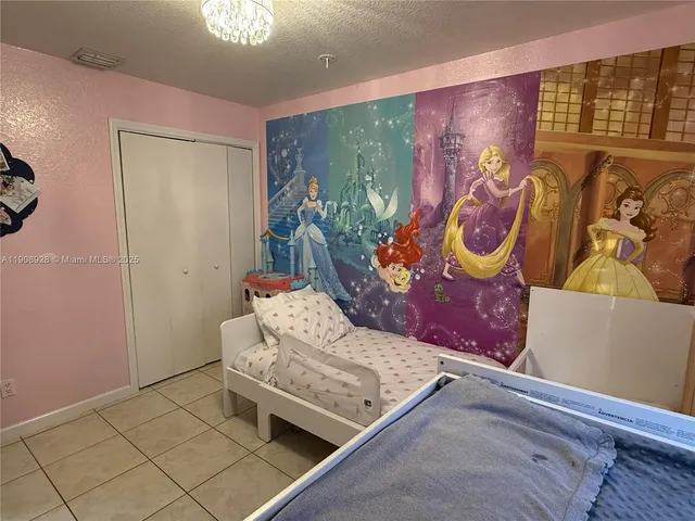 a kitchen with a stove and a refrigerator