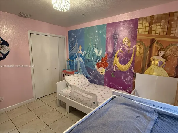 a kitchen with a stove and a refrigerator