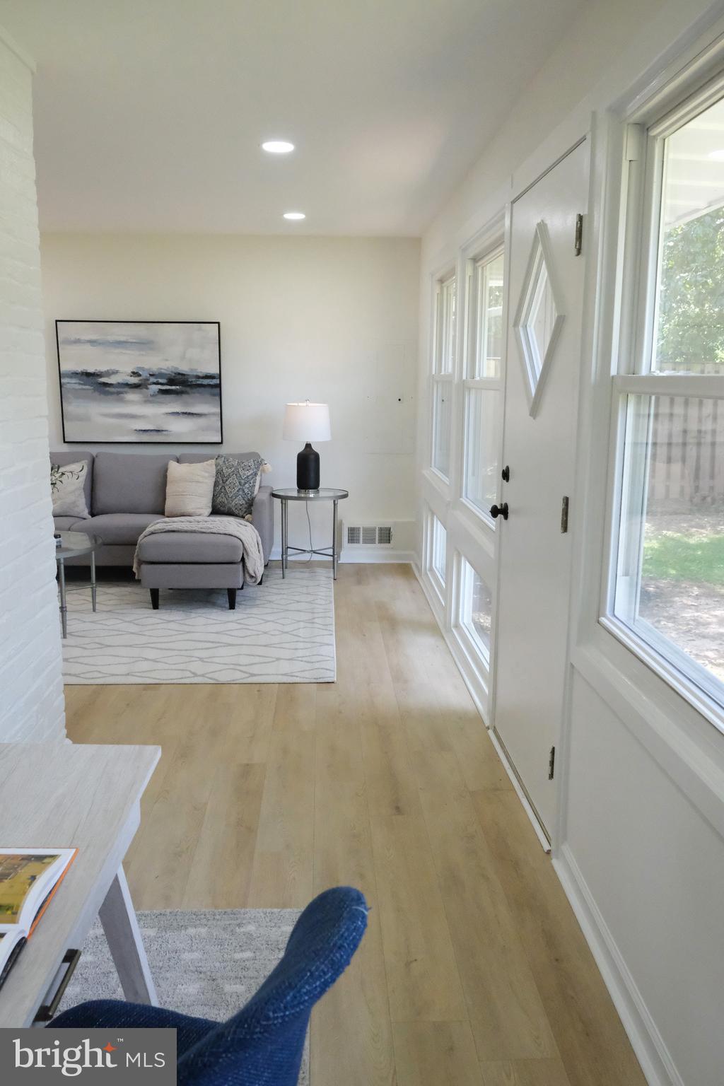 1825 Tilton Drive Silver Spring, MD 20902 - Photo 16 of 31 a living room with furniture and a large window