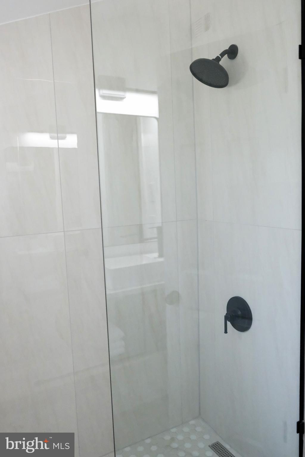 1825 Tilton Drive Silver Spring, MD 20902 - Photo 23 of 31 a bathroom with a shower