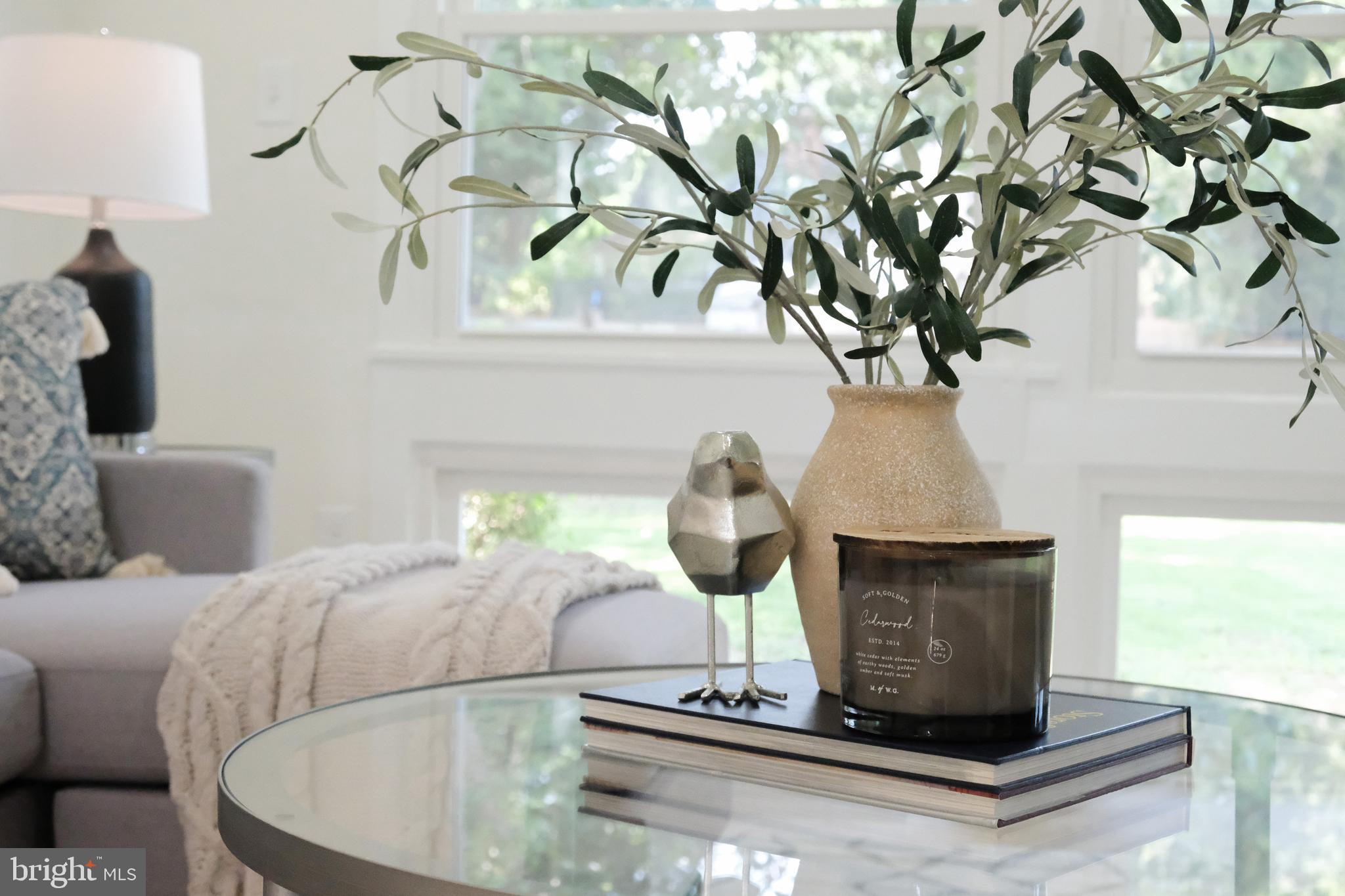 1825 Tilton Drive Silver Spring, MD 20902 - Photo 29 of 31 a vase of flowers sitting on a table