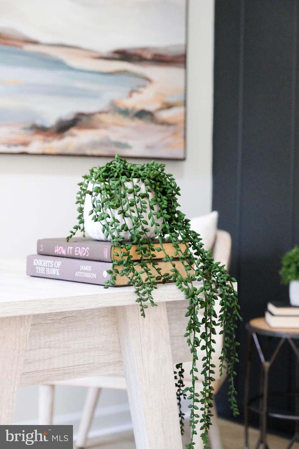 1825 Tilton Drive Silver Spring, MD 20902 - Photo 31 of 31 a vase of flowers sitting on a table