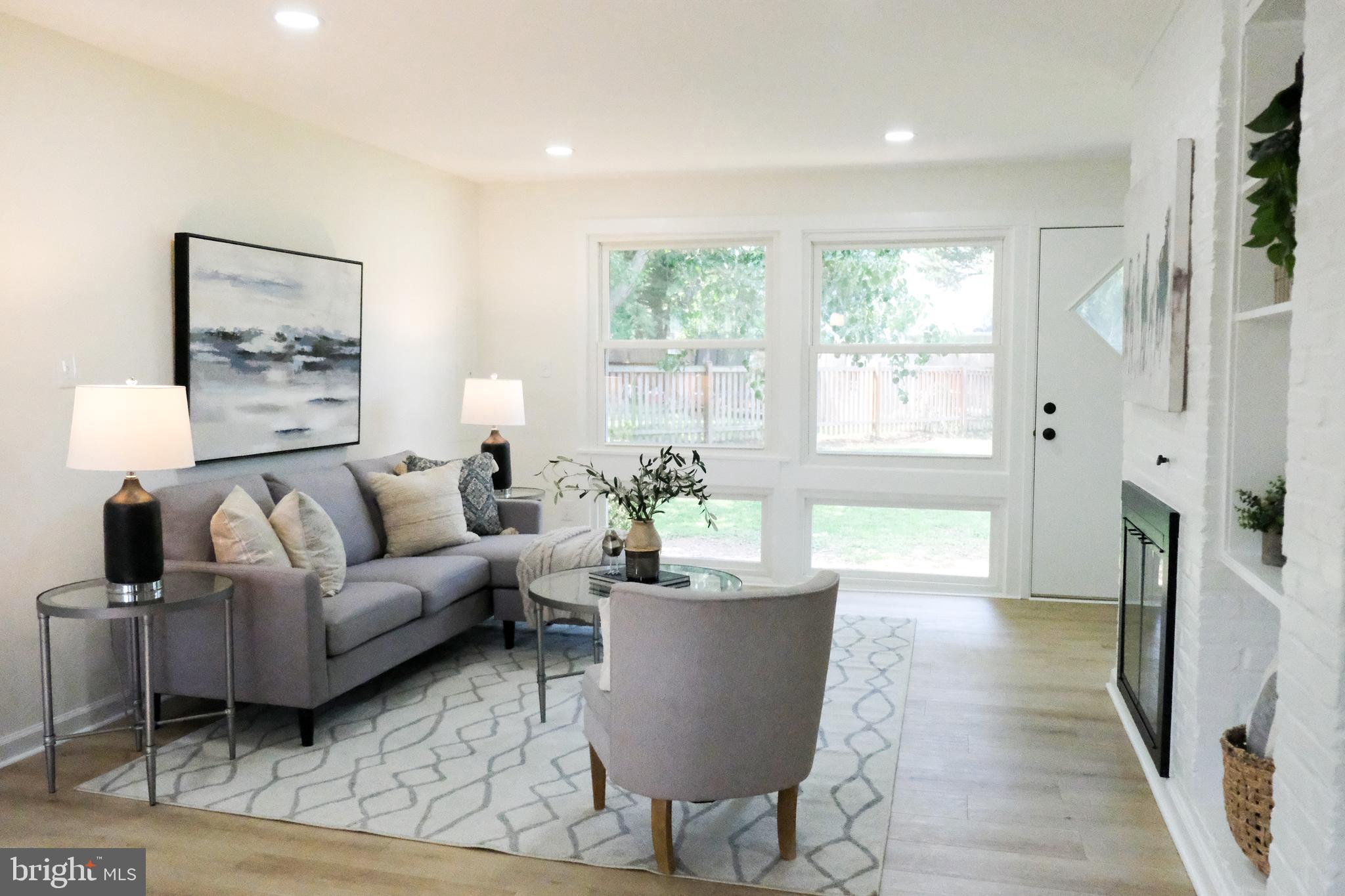 1825 Tilton Drive Silver Spring, MD 20902 - Photo 5 of 31 a living room with furniture and a large window
