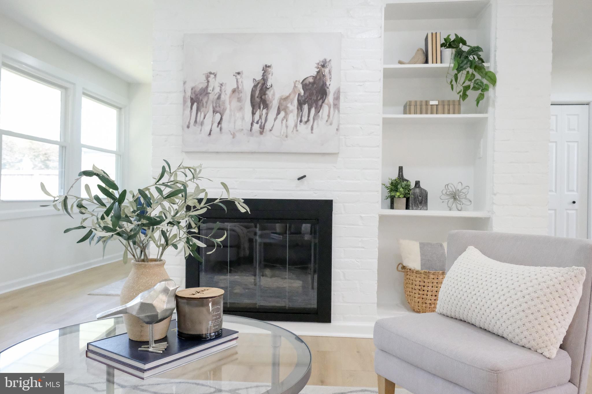 1825 Tilton Drive Silver Spring, MD 20902 - Photo 6 of 31 a living room with furniture and a potted plant