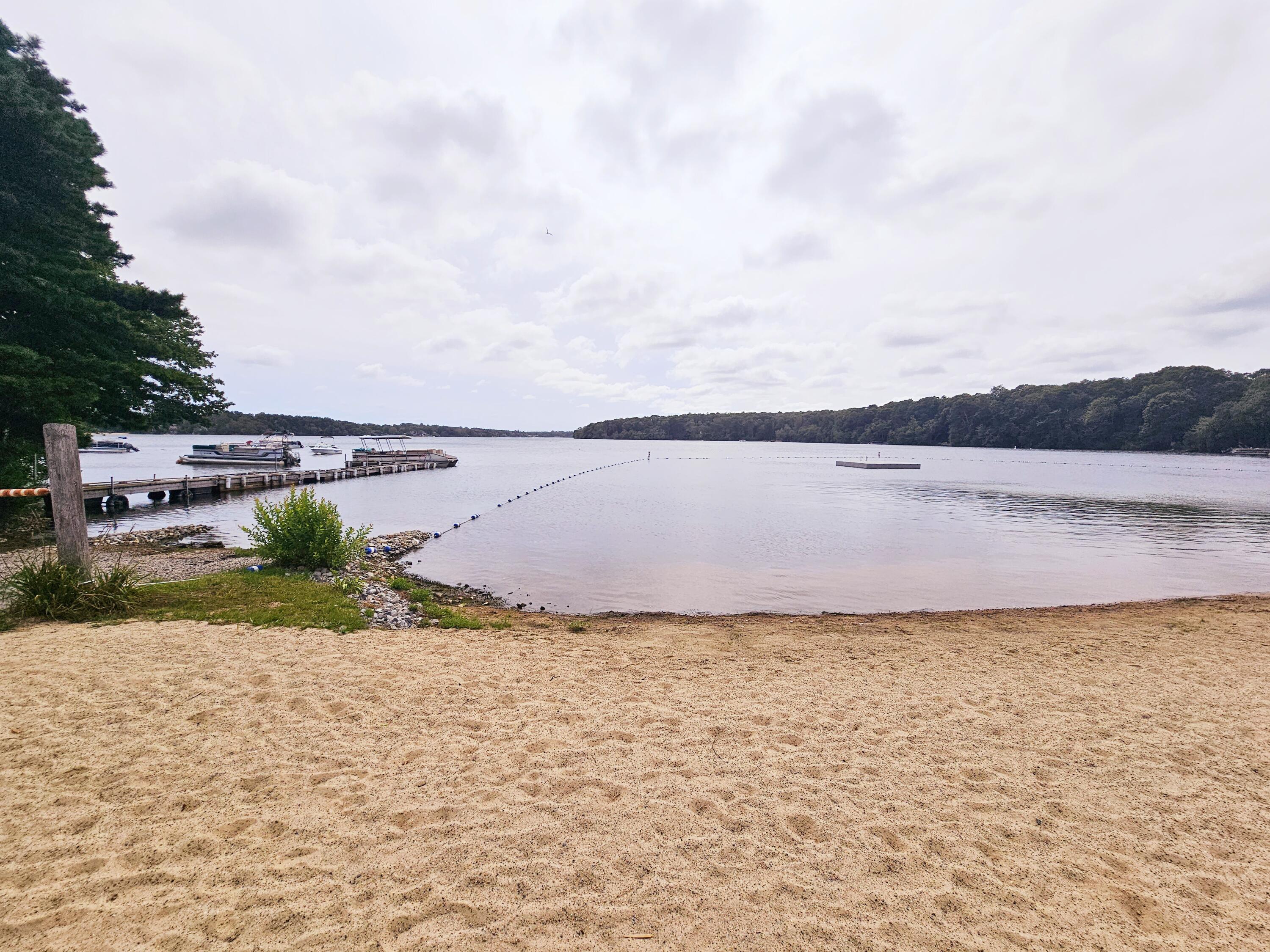 17 Valley Road Mashpee, MA 02649 - Photo 19 of 19 a view of a lake and mountain in the background