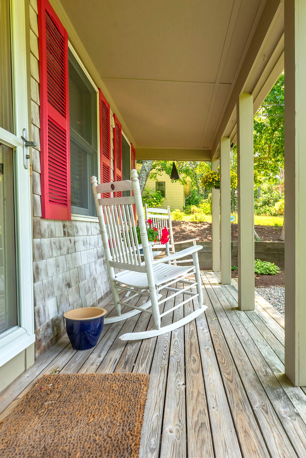 17 Valley Road Mashpee, MA 02649 - Photo 2 of 19 a view of balcony with wooden floor and outdoor seating