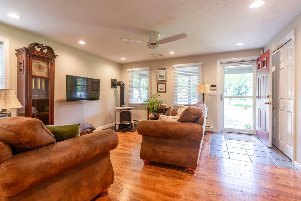 17 Valley Road Mashpee, MA 02649 - Photo 4 of 19 a living room with furniture window and wooden floor