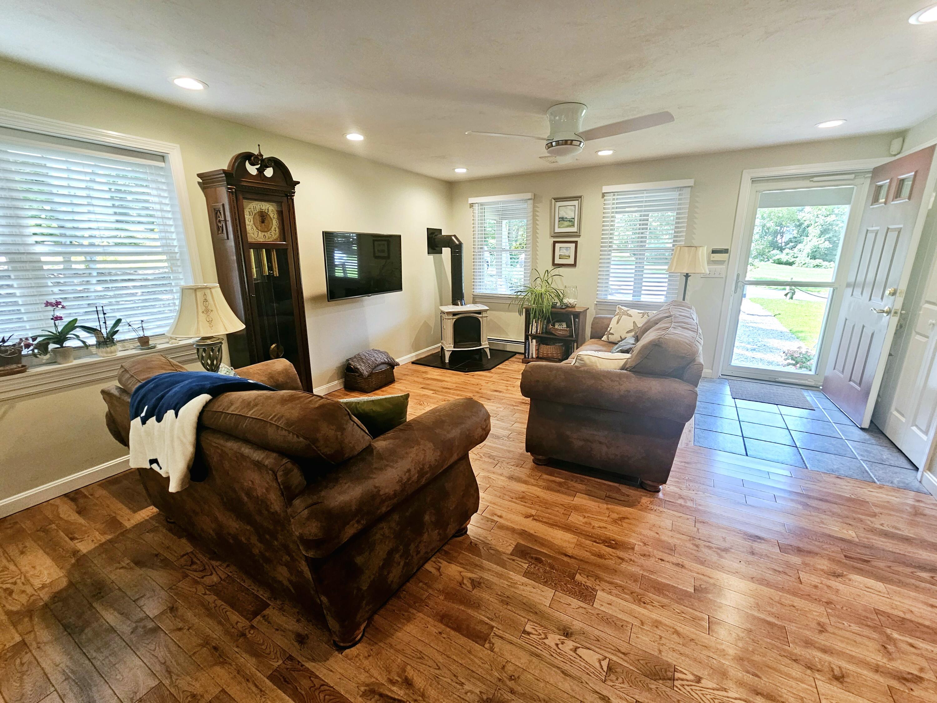 17 Valley Road Mashpee, MA 02649 - Photo 6 of 19 a living room with furniture and a flat screen tv