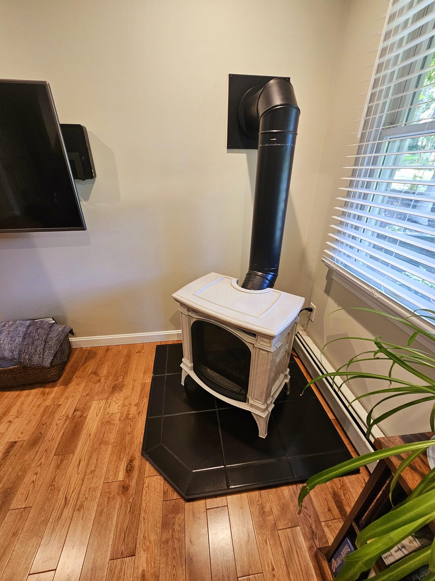 17 Valley Road Mashpee, MA 02649 - Photo 8 of 19 a bed sitting in a bedroom next to a window