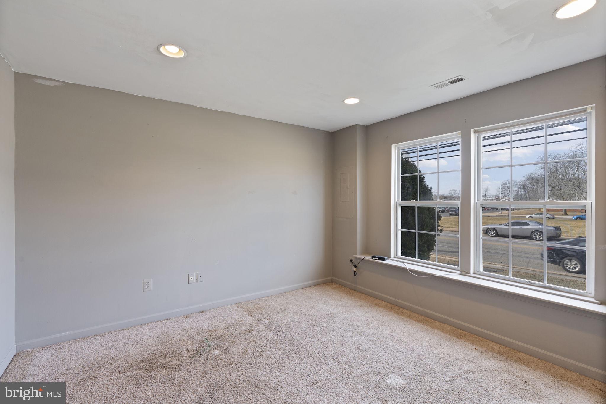 811 Middle River Road Baltimore, MD 21220 - Photo 35 of 55 a view of an empty room with a window