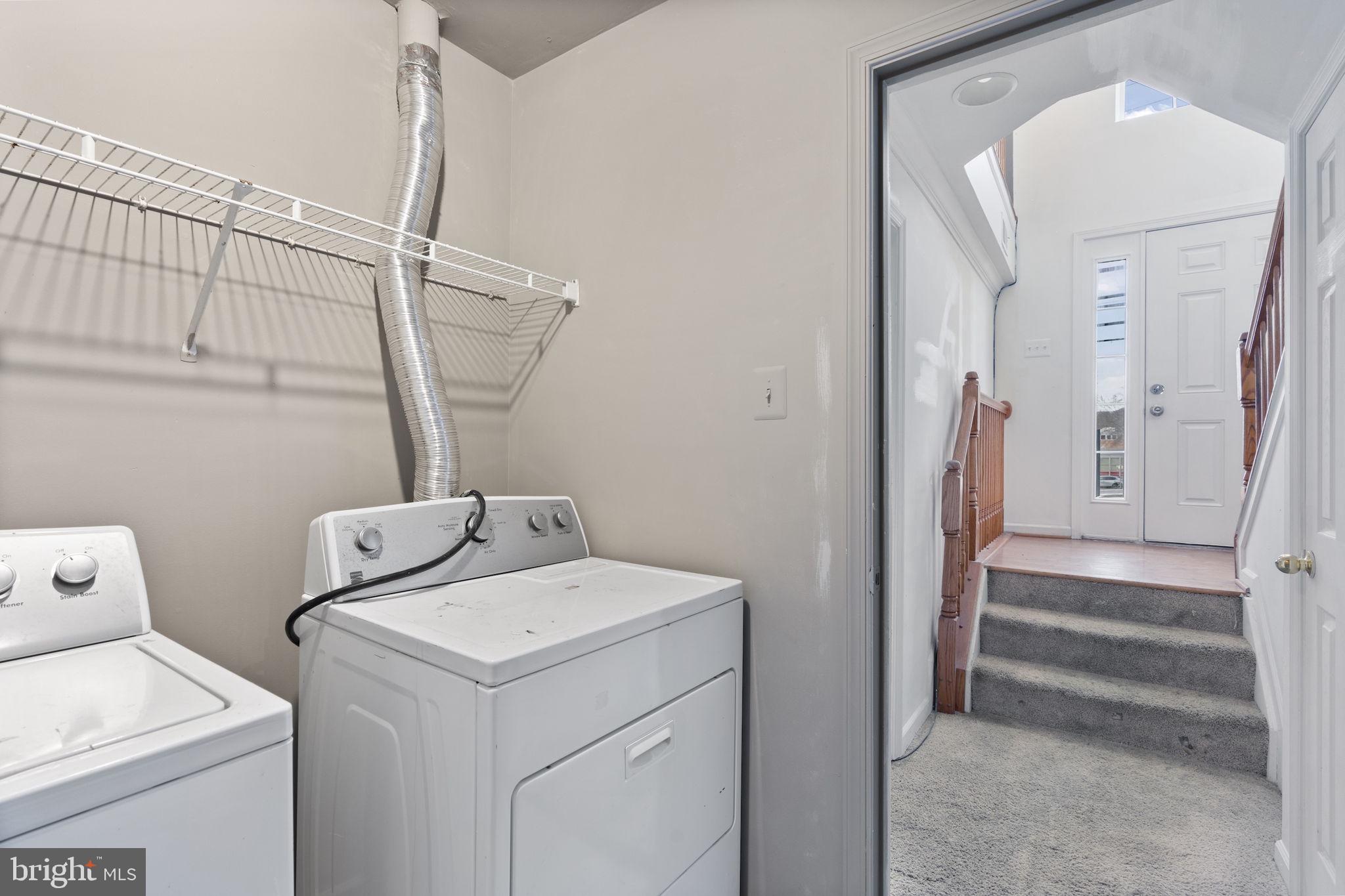 811 Middle River Road Baltimore, MD 21220 - Photo 40 of 55 a utility room with dryer and washer