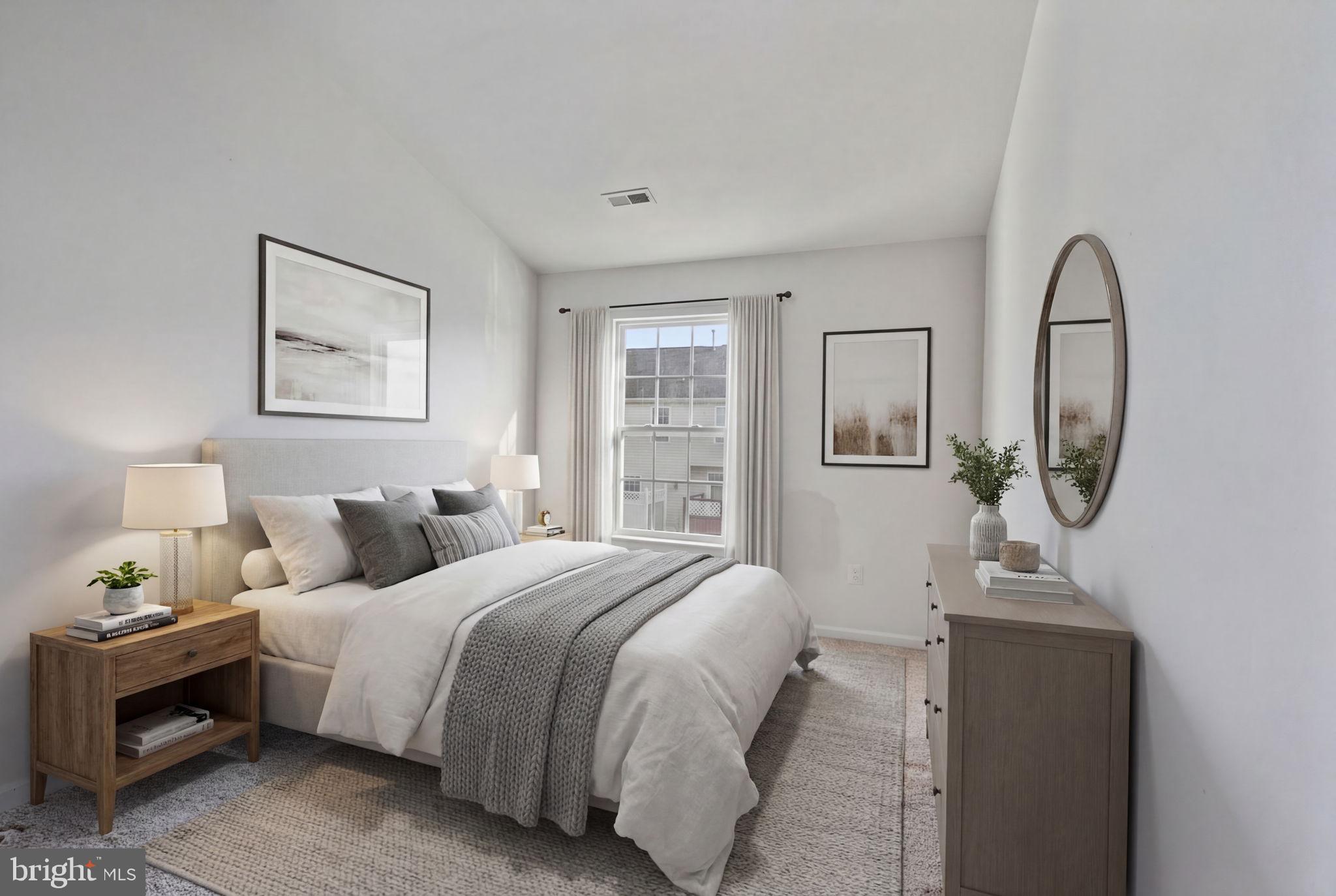 811 Middle River Road Baltimore, MD 21220 - Photo 51 of 55 a bedroom with a bed a mirror and a window