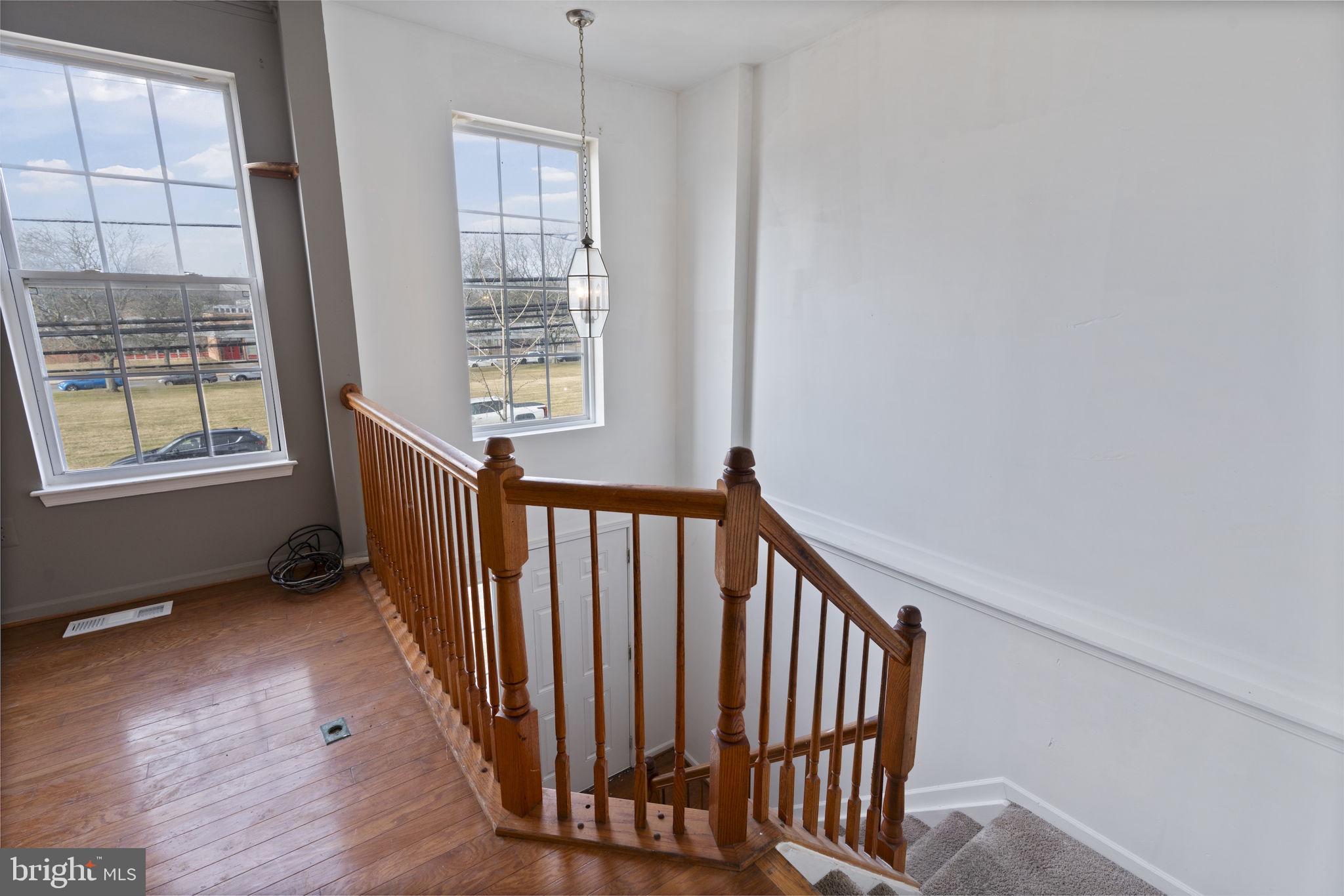 811 Middle River Road Baltimore, MD 21220 - Photo 10 of 55 a view of a hallway with windows