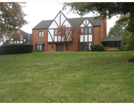 Exterior Front. Roof shingles have life time warranty installed 2007, mature landscaping, exterior flood lights wash front of home on timer,street lights on both front corners of property