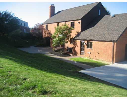 Exterior Back. PRIVATE REAR YARD, sidewalks and drive installed in 2007,freshly painted windows and doors.
