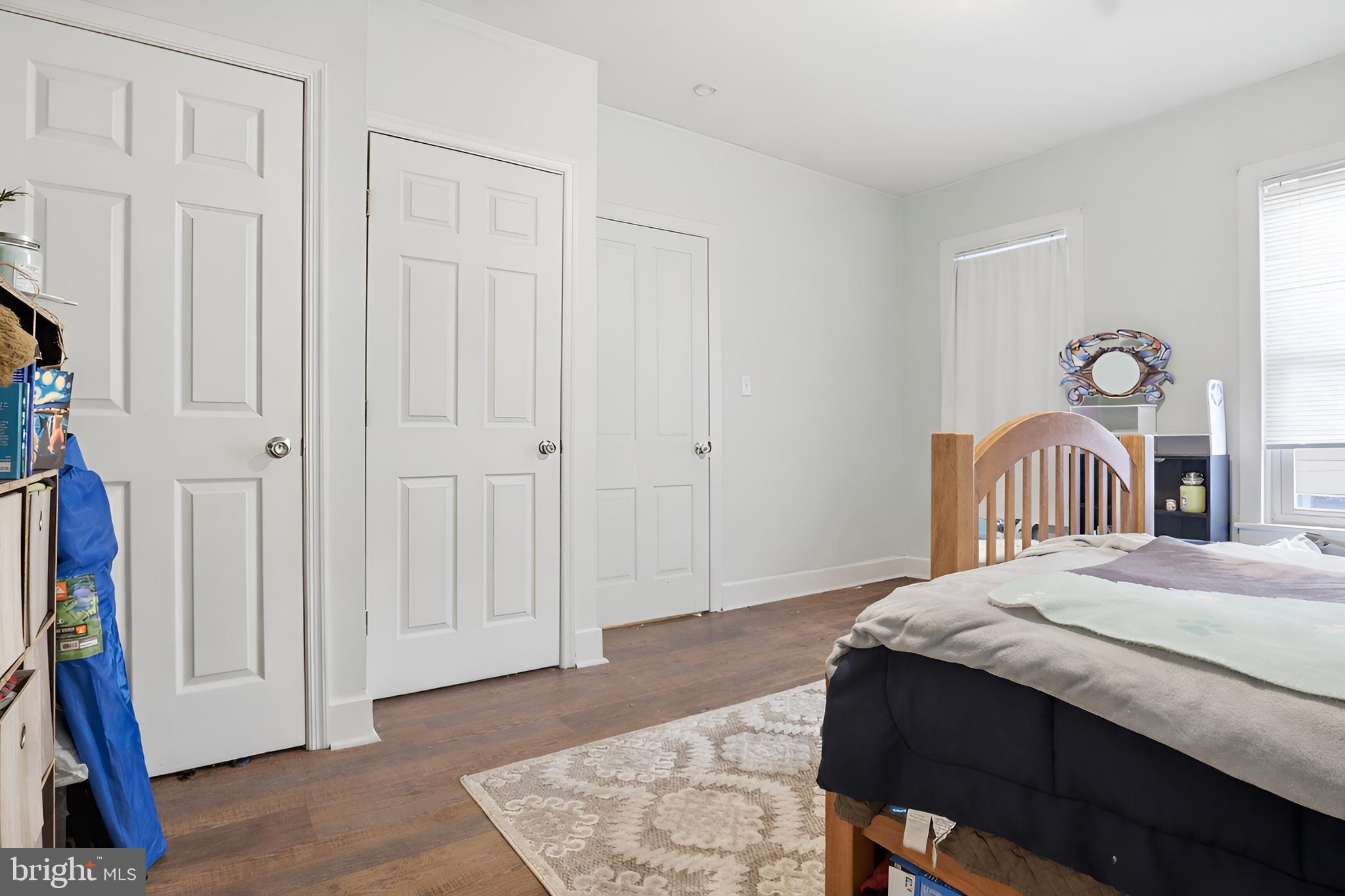 83 North Main Street Dover, PA 17315 - Photo 18 of 28 a bedroom with a bed and a window