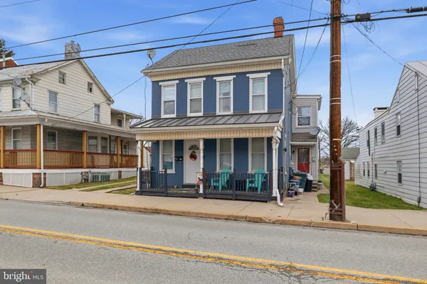a view of a building on a street