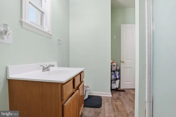 a bed room with two beds and painted walls