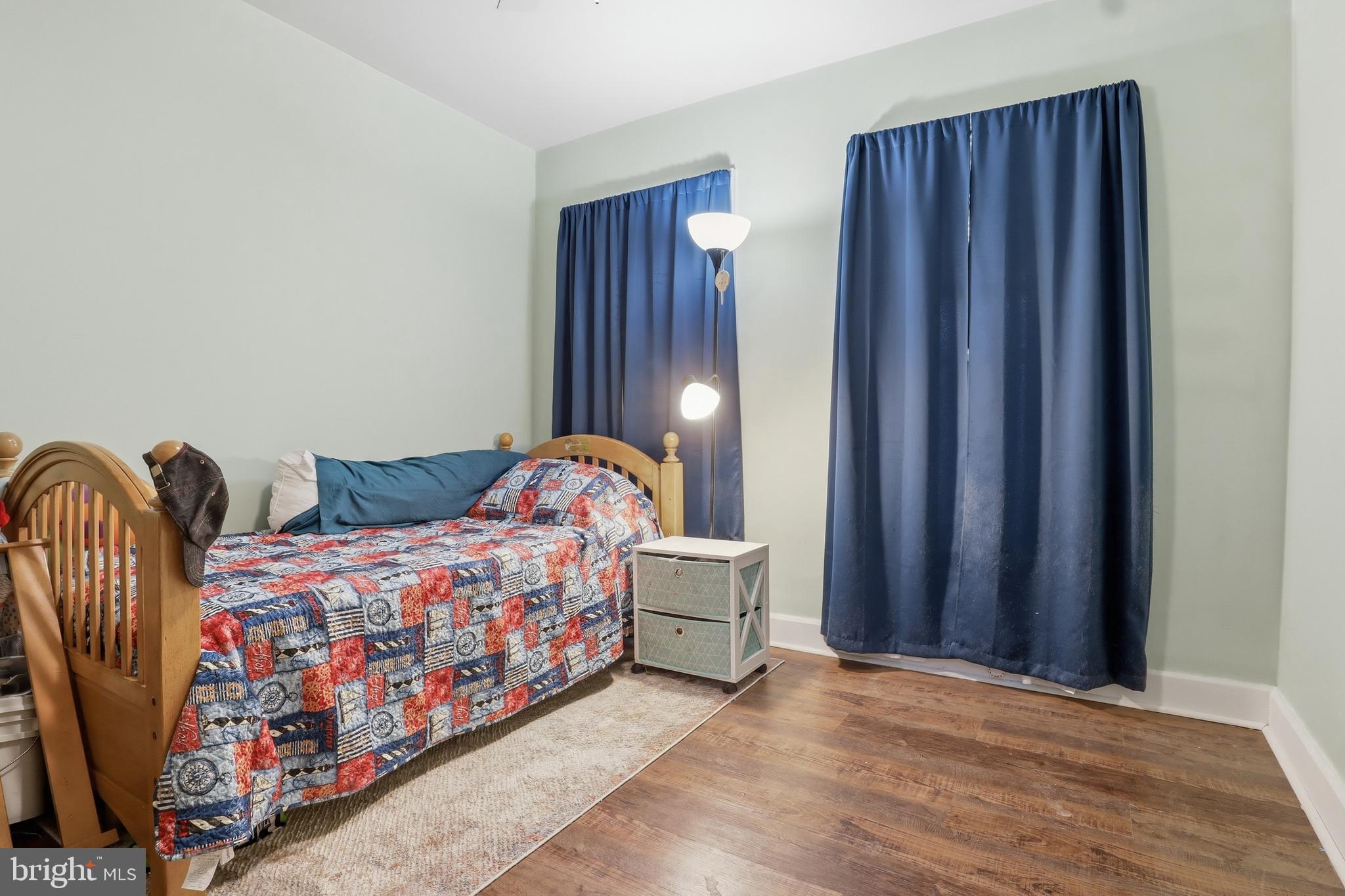 83 North Main Street Dover, PA 17315 - Photo 22 of 28 a bed room with two beds and painted walls