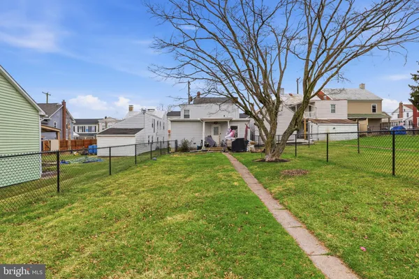 a car parked in front of a house