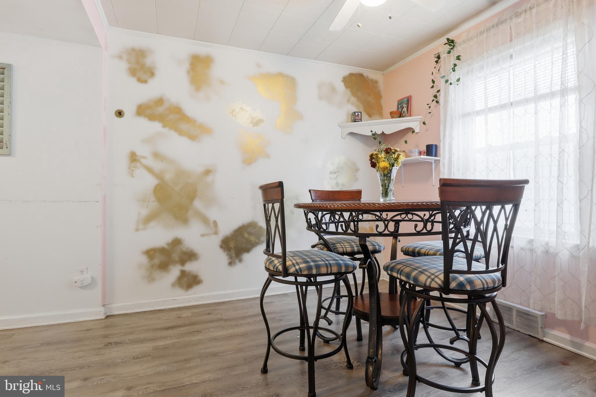 83 North Main Street Dover, PA 17315 - Photo 7 of 28 a view of a dining room with furniture and wooden floor