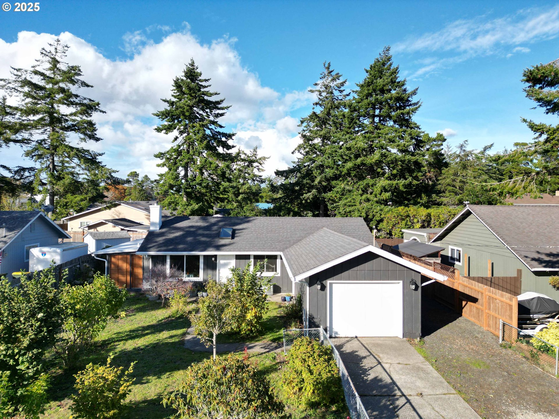 2045 19th Street Florence, OR 97439 - Photo 1 of 43 front view of a house with a yard