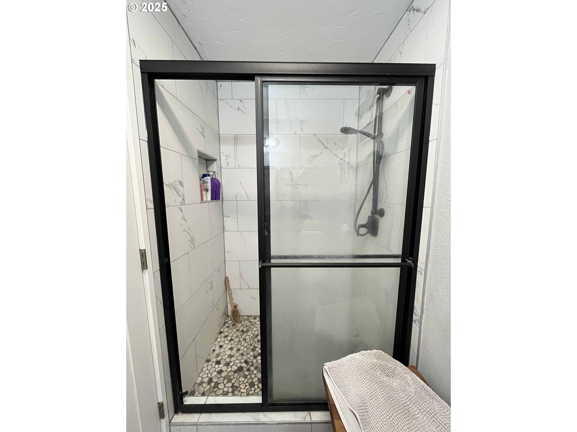 2045 19th Street Florence, OR 97439 - Photo 15 of 43 a bathroom with a shower and a toilet