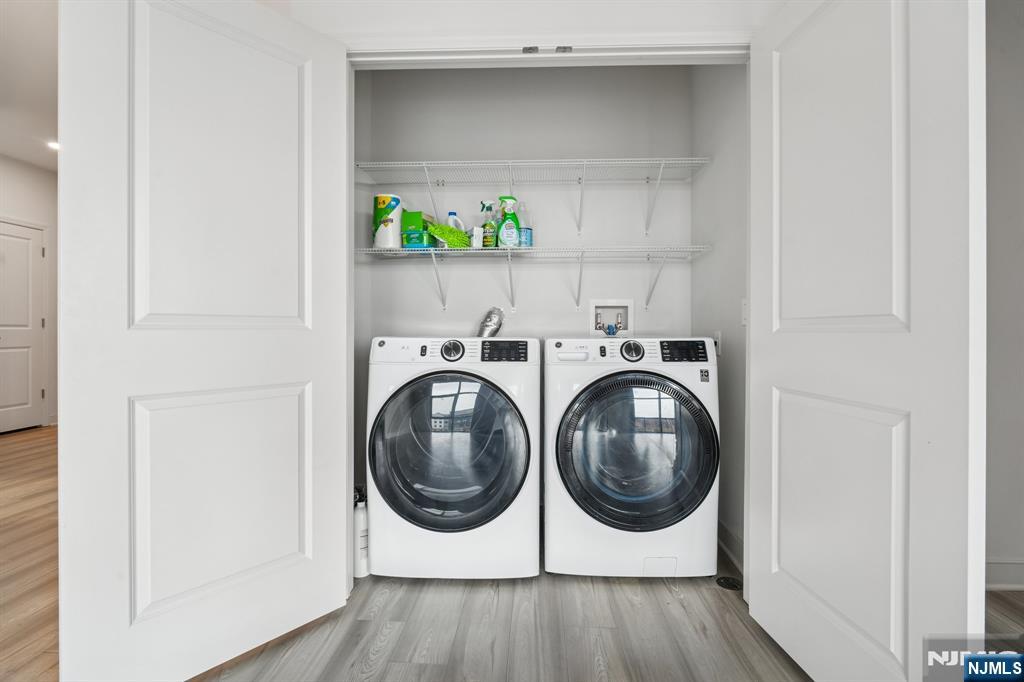 300 Market Street, Unit 422 Montvale, NJ 07645 - Photo 8 of 26 a utility room with dryer and washer